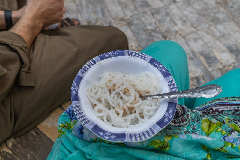 bowl of kulfi falooda on lap